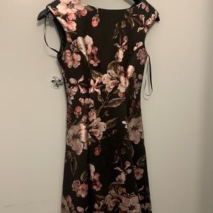 This dress is from dress barn and is black with pink flowers.